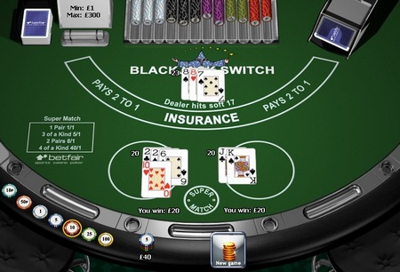 An example of a Blackjack Switch game in progress; the player has made a 21 and a blackjack against a dealer 20, winning both hands.